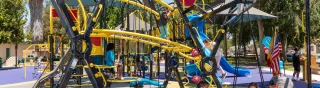 Valley Plaza Playground with kids playing